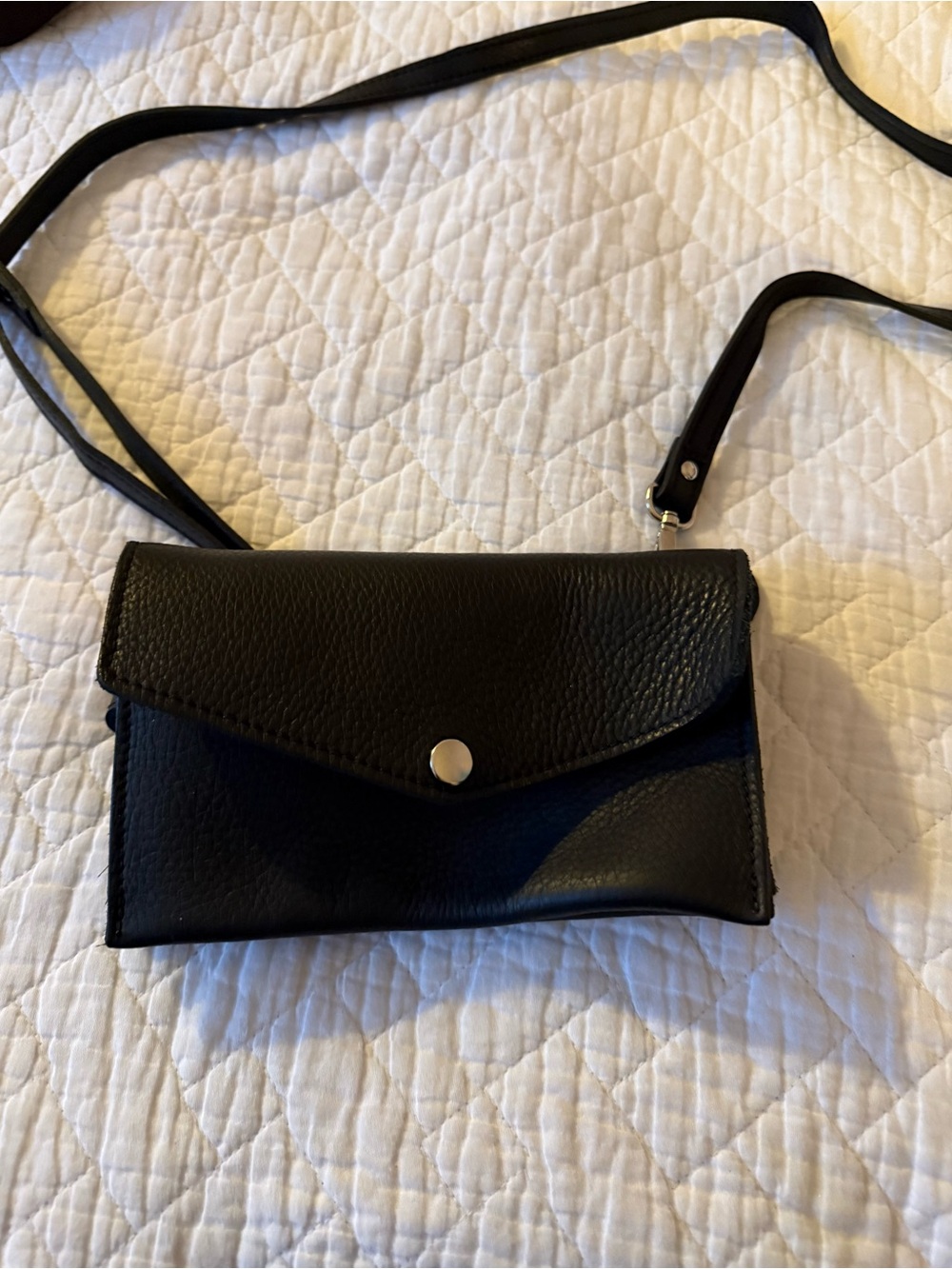 ROOTS Leather Accordion Bag.